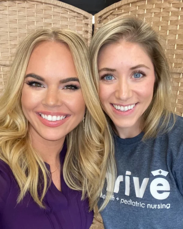 Two smiling women representing VioletFig Marketing team for social media growth.