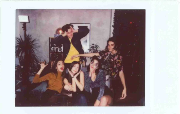 Group of young women and a man at a party, illustrating common digital marketing errors.