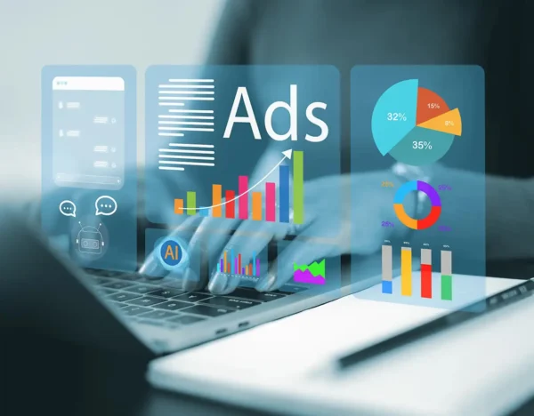 Digital marketing analytics with charts and graphs on a laptop screen.